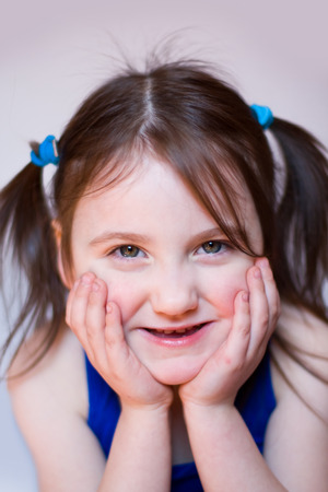 Smiling five year old girlの写真素材