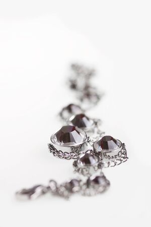 Jewelry with crystals on a white backgroundの写真素材