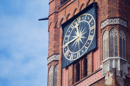 Clock on a town hall tower, Torun, Poland