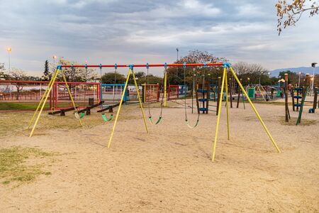 Children kid playground for leisure and recreation activity with toy and slider leftover in the park in childhood color style.の写真素材
