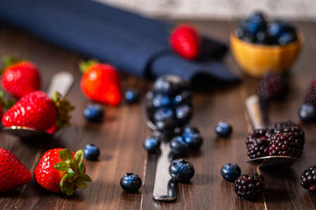 Close-up image of berries isolated, blueberry, strawberry, blackberry