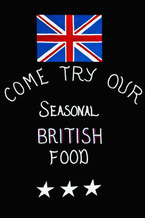 Sign offering seasonal british food at some London's bar.の写真素材