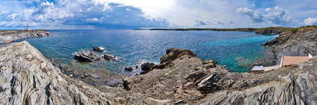 30 meters tall Favaritx lighthouse seems to be at the end of the world.の写真素材