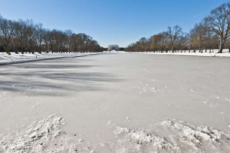 The Reflecting Pool after a snow blizzard at the Mall in DC, USAの写真素材