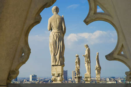 Statues at the roof of Il Duomo di Milano, the fourth-largest church in the world.の写真素材