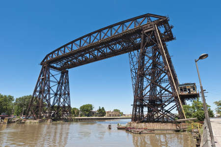 Old Nicolas Avellaneda steel bridge across Riachuelo river near Caminitoの写真素材