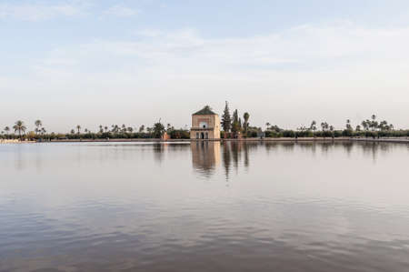 Pavillion reflection on Menara Gardens basin at Marrakech, Morocco