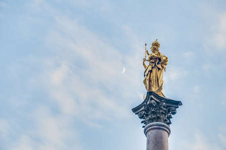 The Mariensplatz, a Marian column erected in 1638 to celebrate the end of Swedish occupation during the Thirty Years' War located on the Marienplatz in Munich, Germany.のeditorial素材