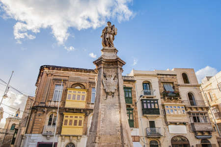 Statue that commemorates the Great Siege of 1565  known as the Victory Monument at Vittoriosa Square in Birgu, Maltaのeditorial素材