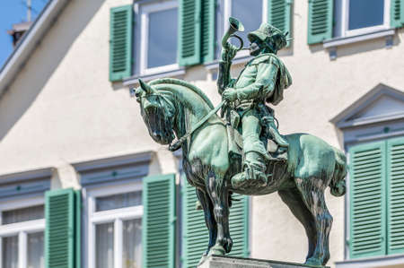 Postman Michel Fountain (Postmichelbrunnen) or  Fish Fountain (Fischbrunnen) in honor to messenger Michel Banhard in Esslingen am Neckar, near Stuttgart, Germanyのeditorial素材