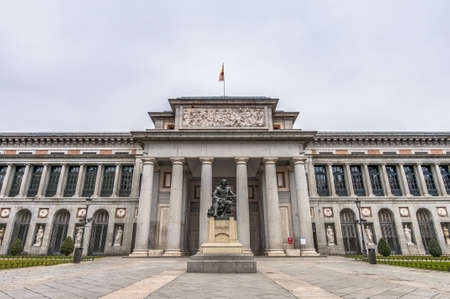 Prado Museum facade and Cervantes statue at Madrid, Spainのeditorial素材
