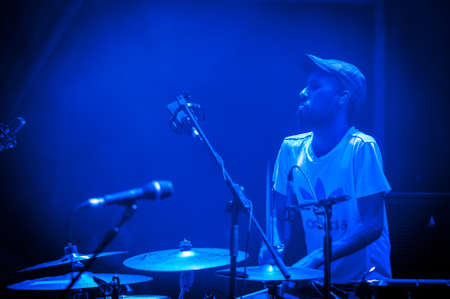 BARCELONA - SEP 22: Spanish singer Macaco performs at the "Hard Rock Rocks La Merce" concert within La Merce celebrations on September 22, 2012 in Barcelona, Spainのeditorial素材
