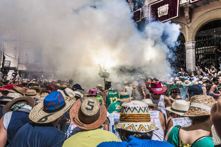 SITGES, SPAIN - AUG 23: Ball de Diables group on Cercavila performance within the Festa Major celebrations Aug 23, 2012 in Sitges, Spain.のeditorial素材
