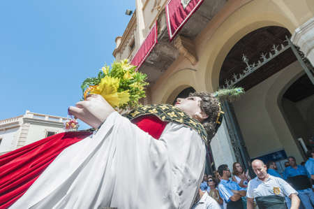 SITGES, SPAIN - AUG 23: Gegant de la Vila  on Cercavila performance within the Festa Major celebrations Aug 23, 2012 in Sitges, Spain.のeditorial素材