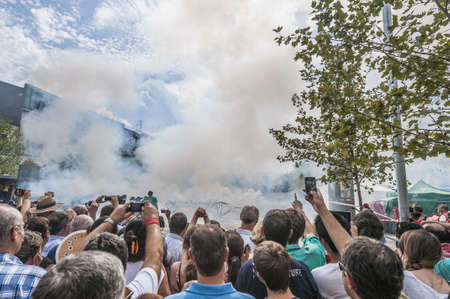VILAFRANCA DEL PENEDES, SPAIN - AUG 29: Tronada on Cercavila performance within the Festa Major celebrations Aug 29, 2012 in Vilafranca del Penedes, Spain.のeditorial素材