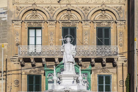 Saint Lawrence statue located at Vittoriosa Square in Birgu, Maltaの写真素材