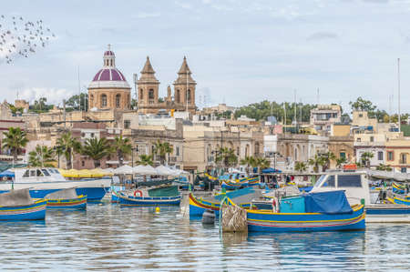 Harbor of Marsaxlokk, a traditional fishing village located in the south-eastern part of Malta.の写真素材