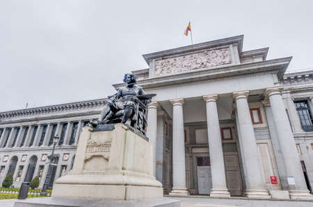 Prado Museum facade and Cervantes statue at Madrid, Spainのeditorial素材