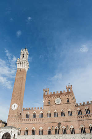 Public Palace and it's Mangia Tower located at Il Campo Square in Siena, Tuscany region, Italyのeditorial素材