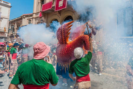 SITGES, SPAIN - AUG 23: Aliga fantastic figure on Cercavila performance within the Festa Major celebrations Aug 23, 2012 in Sitges, Spain.のeditorial素材