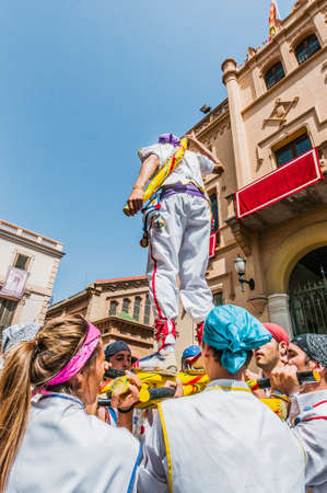 SITGES, SPAIN - AUG 23: Ball de Pastorets group on Cercavila performance within the Festa Major celebrations Aug 23, 2012 in Sitges, Spain.のeditorial素材