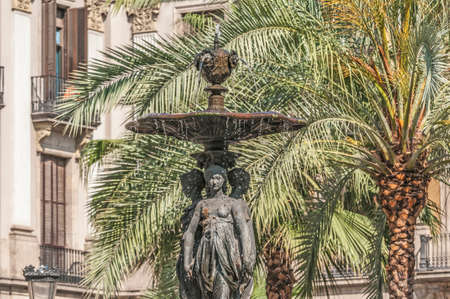 Fountain of the Royal Square (Placa Reial) in Barcelona, Spainの写真素材