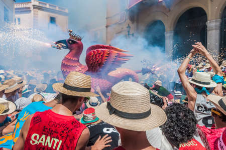 SITGES, SPAIN - AUG 23: Aliga fantastic figure on Cercavila performance within the Festa Major celebrations Aug 23, 2012 in Sitges, Spain.のeditorial素材