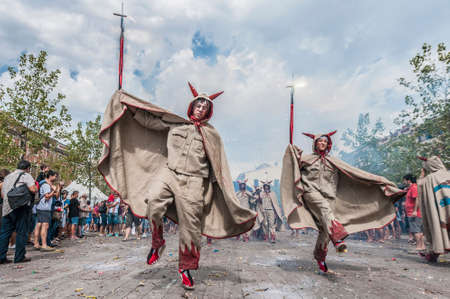 VILAFRANCA DEL PENEDES, SPAIN - AUG 29: Ball de Diables dance on Cercavila performance within the Festa Major celebrations Aug 29, 2012 in Vilafranca del Penedes, Spain.のeditorial素材