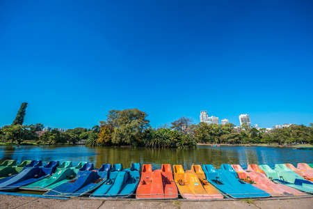 Colorful boats on Parque Tres de Febrero, also known as the Bosques de Palermo (Palermo Woods), a 400 hectares urban park located in the neighborhood of Palermo in Buenos Aires, Argentina.のeditorial素材