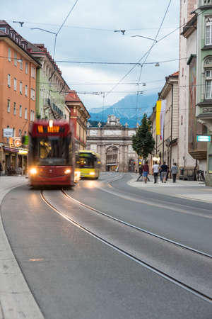 INNSBRUCK, AUSTRIA - AUG 14: Triumphal Arch modeled after those in Rome on the south end of the main artery of Innsbruck, Maria-Theresien Street on Aug 14, 2013 in Innsbruck, Austria.のeditorial素材
