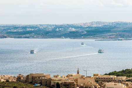 Channel Line Ferry on its way between Gozo Island and Maltaの写真素材