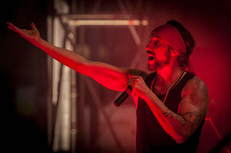 BARCELONA - SEP 22: Spanish singer Macaco performs at the "Hard Rock Rocks La Merce" concert within La Merce celebrations on September 22, 2012 in Barcelona, Spainのeditorial素材