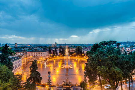 Piazza del Popolo (People's Square) named after the church of Santa Maria del Popolo in Rome, Italyの写真素材
