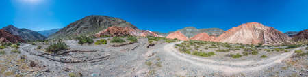 Los Colorados path in Purmamarca, near Cerro de los Siete Colores (The Hill of Seven Colors), in the colourful valley of Quebrada de Humahuaca in Jujuy Province, northern Argentina.の写真素材