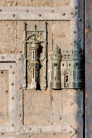 City Hall medieval bronze made lock and door pull in Mons, capital of the Wallonian province of...