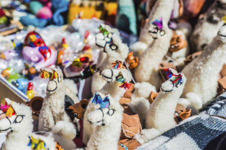 Made of wool llamas souvenirs in Purmamarca, near Cerro de los Siete Colores (The Hill of Seven Colors), in the colourful valley of Quebrada de Humahuaca in Jujuy Province, northern Argentina.の写真素材