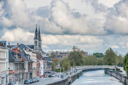 Escaut River passing through Tournai, on the Hainaut province of the Wallonian region in Belgium.のeditorial素材