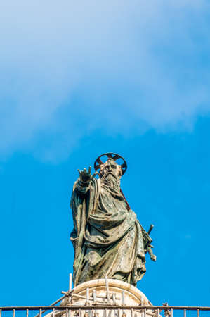 Bronze statue of Saint Paul that crowns the marble Column of Marcus Aurelius which has stood on Piazza Colonna since 193 CE in Rome, Italy.のeditorial素材