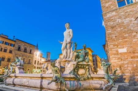 The Fountain of Neptune by Bartolomeo Ammannati in front of the Palazzo Vecchio at Piazza della Signoria in Florence, Italyの写真素材