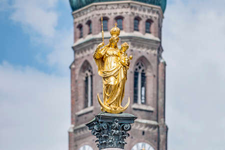 The Mariensaule, a Marian column erected in 1638 to celebrate the end of Swedish occupation during the Thirty Years' War located on the Marienplatz in Munich, Germany.のeditorial素材