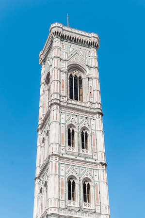 Campanile (belltower) of the Basilica di Santa Maria del Fiore (Basilica of Saint Mary of the Flower), the main church of Florence, Italyの写真素材