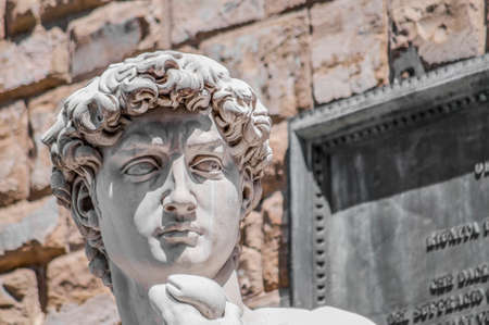 Copy of Michelangelo's David statue standing in its original location, in front of the Palazzo Vecchio at Piazza della Signoria in Florence, Italyのeditorial素材