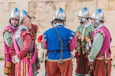 BIRGU - NOV 04: In Guardia re-enactment portraying the inspection of the fort and its garrison by the Grand Bailiff of the Order of the Knights of St. John on November 04, 2012 in Birgu, Malta.のeditorial素材