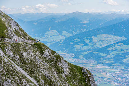 Hikers at Norkette mountain and ski area in Tyrol region, nord of Innsbruck in western Austria.