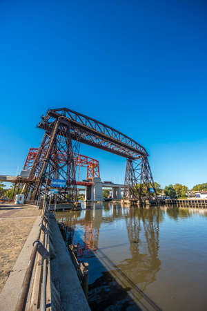 Old Nicolas Avellaneda steel bridge across Riachuelo river near Caminito neighborhood in Buenos...
