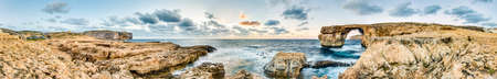 Azure Window natural arch featuring a table-like rock over the sea in the Maltese island of Gozo.の写真素材