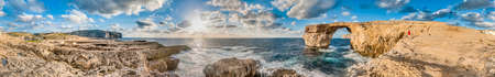 Azure Window natural arch featuring a table-like rock over the sea in the Maltese island of Gozo.の写真素材