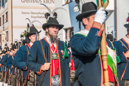 OBERPERFUSS, AUSTRIA - AUG 15: Villagers dressed in their finest traditional costumes during Maria Ascension procession along this village near Innsbruck on Aug 15, 2013 in Oberperfuss, Austria.のeditorial素材