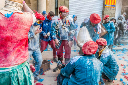 BERGA, ES - FEBRUARY :  Flour War between Carlists and Liberals performed within the carnival celebrations February 10, 2013 in Berga, ES.のeditorial素材