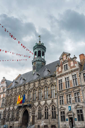 Gothic style City Hall and it's renaissance bell tower on the central square in Mons, capital of the Wallonian province of Hainaut in Belgium.のeditorial素材